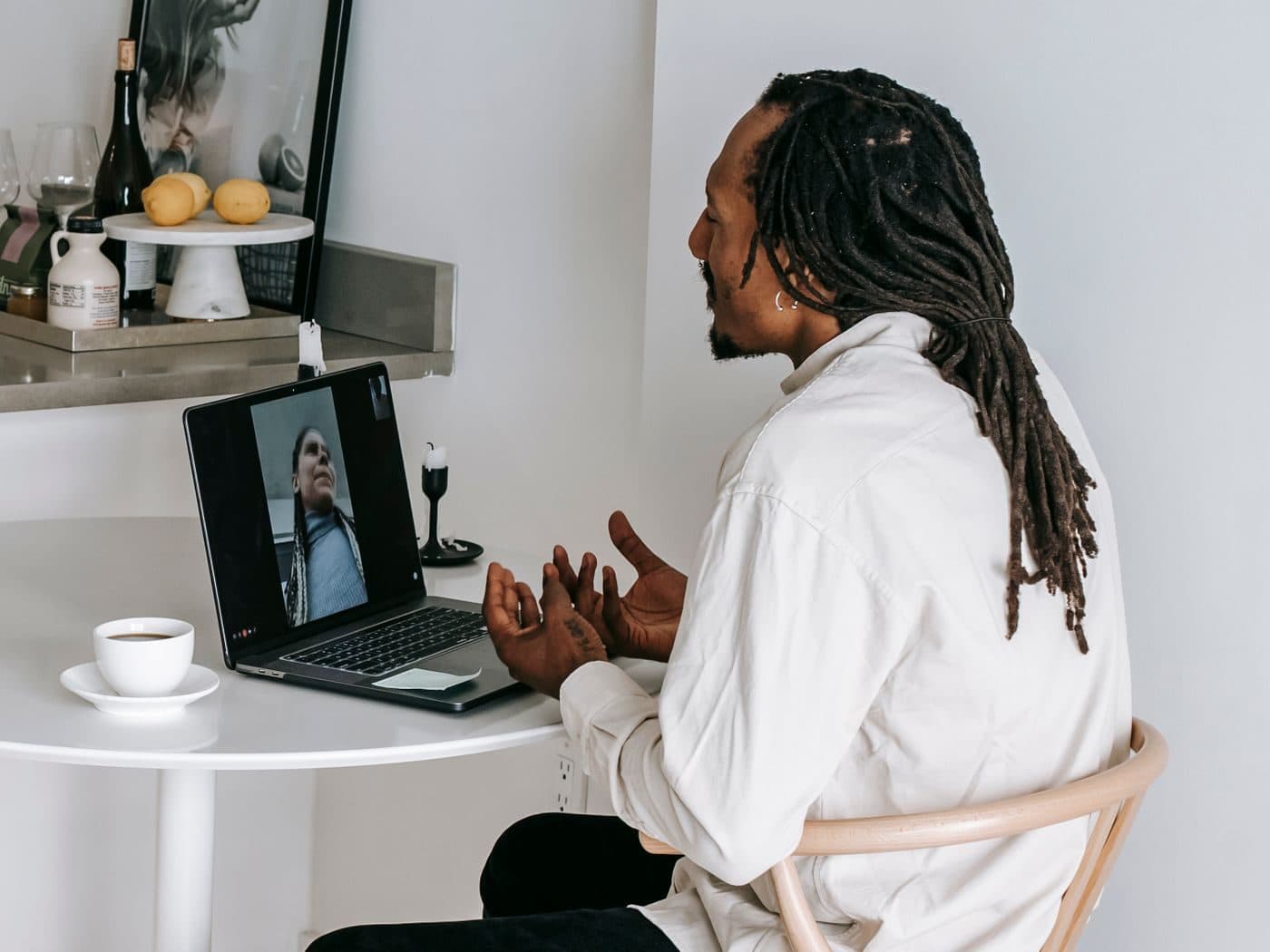 Investor reviewing their portfolio on a laptop at home