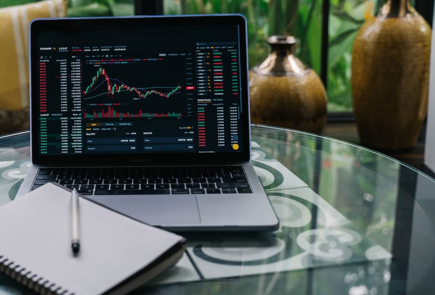 Laptop showing a live candlestick chart of portfolio value